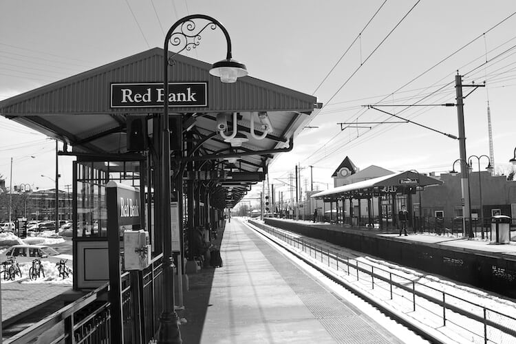 A black and white photo of the train station in Red Bank New Jersey.