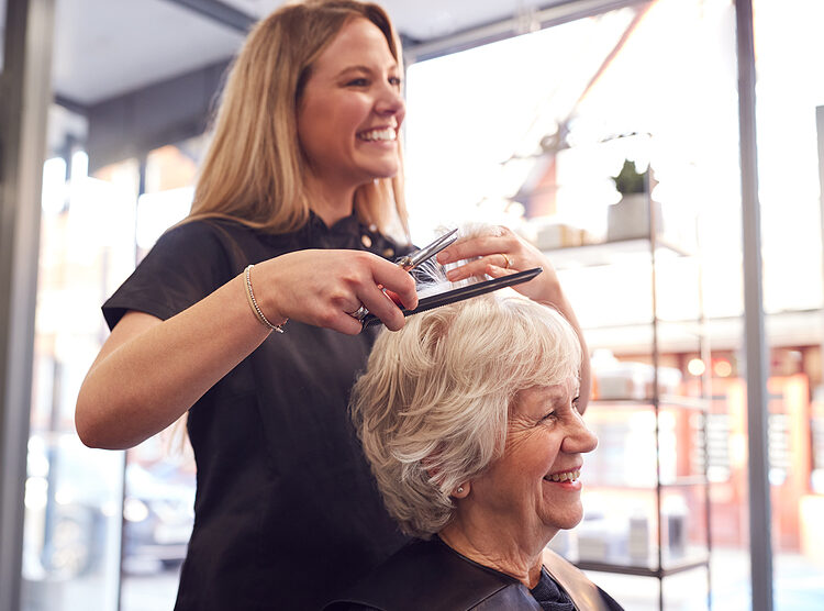 Older woman at the salon getting a haircut