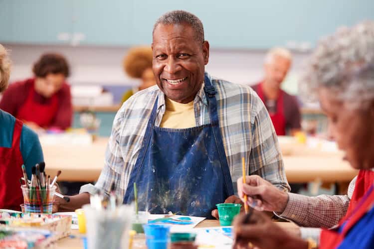 senior enjoying painting