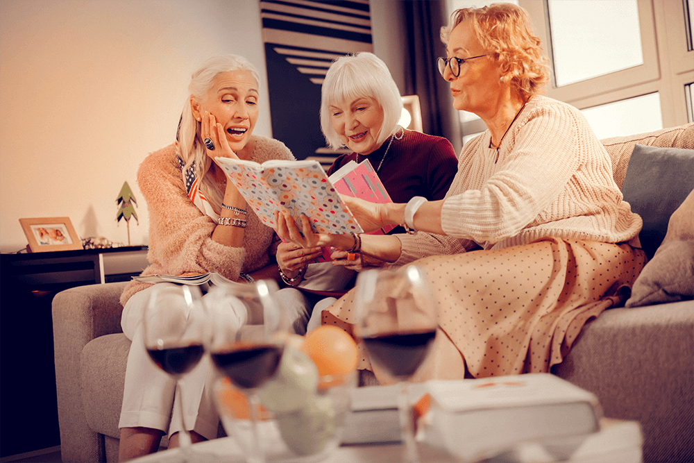 women looking at book