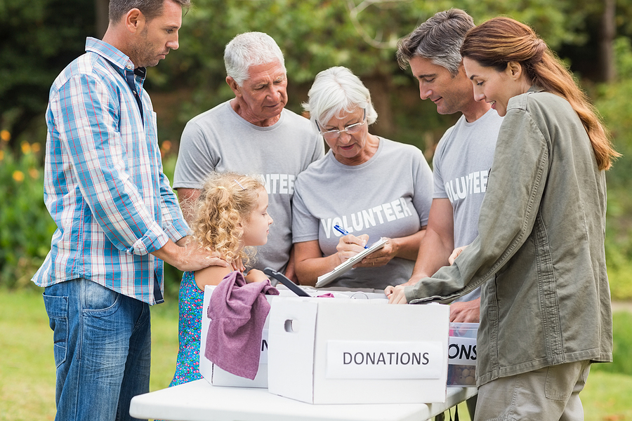 Family Volunteering and donating items together