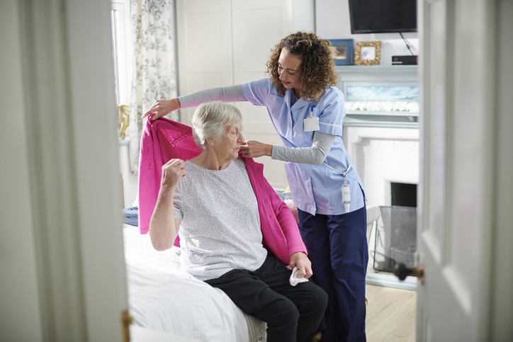 Nurse Helping Senior with Home Care