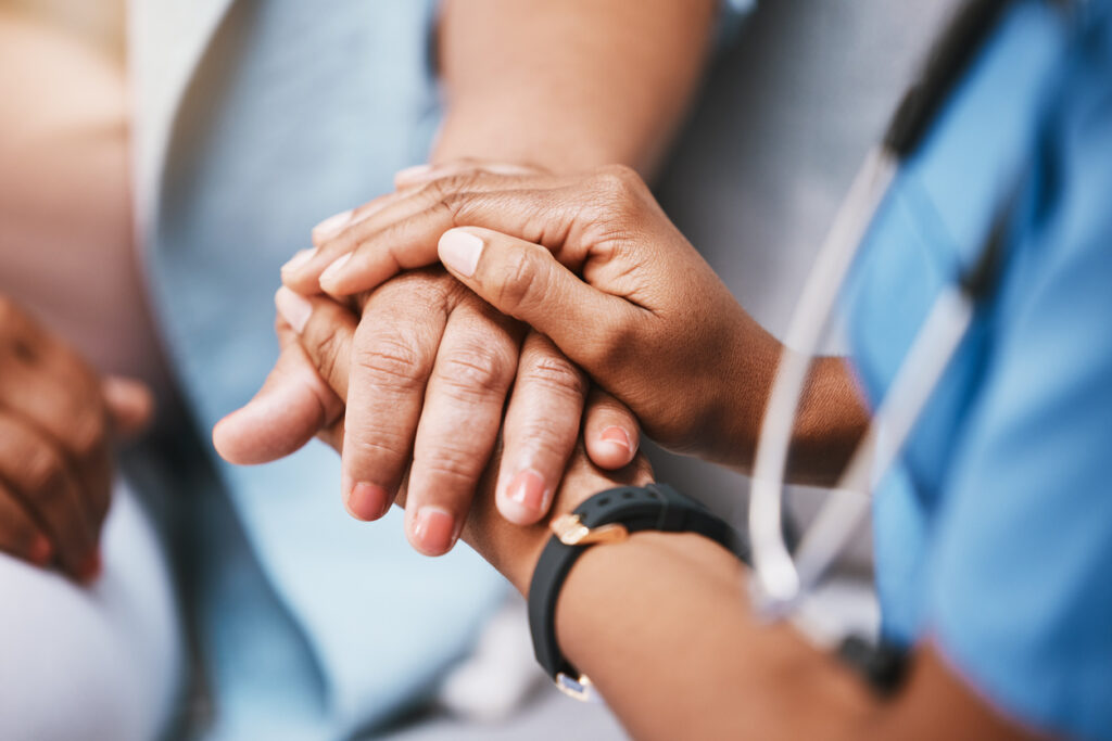 Nurse and Patient Hand Close-up