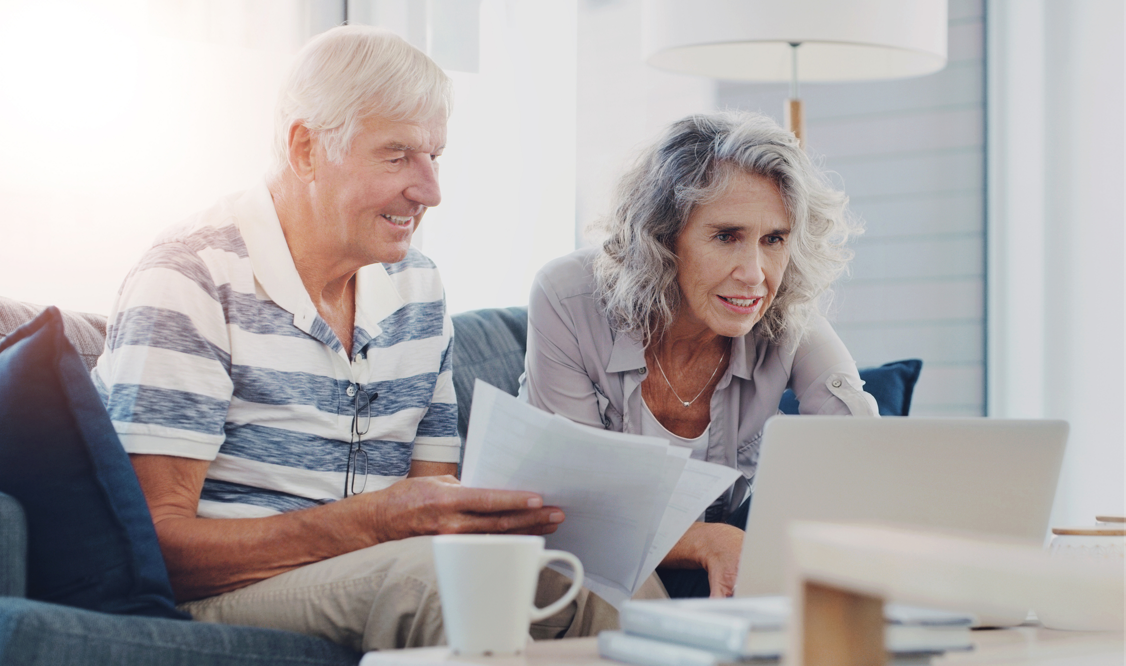 A senior couple exploring senior living costs