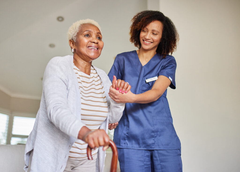 Nurse Helping Senior Woman Regain Balance
