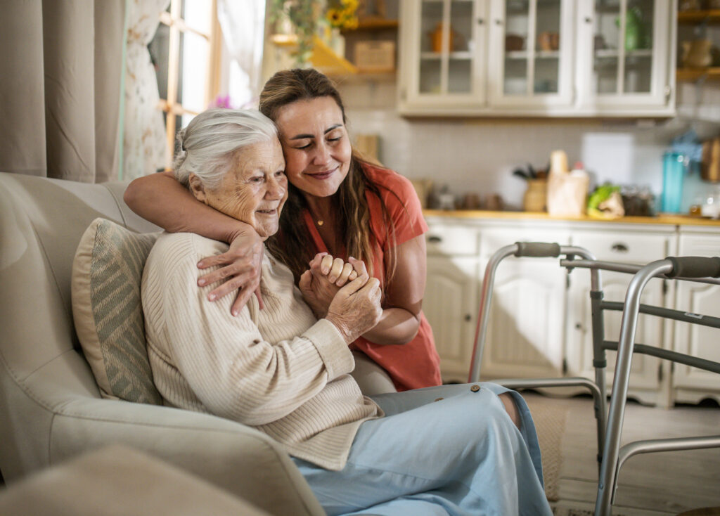 Compassionate Woman of Adult and Senior Woman Smiling