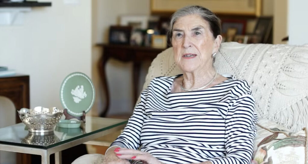 senior woman in striped shirt