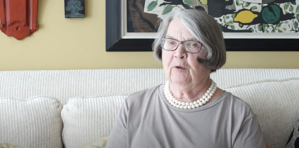 senior woman with pearl necklace